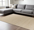 5' X 7' Tan And Ivory Hand Woven Area Rug