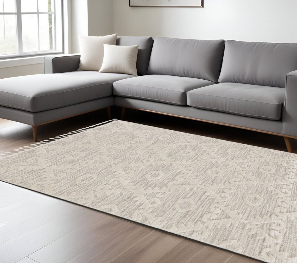 5' X 8' Beige and Ivory Geometric Area Rug
