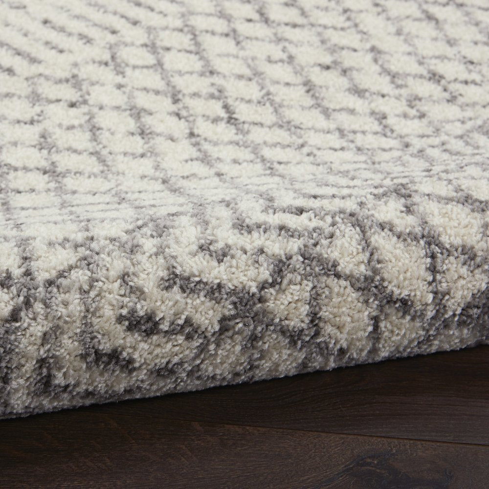 5' X 7' Gray And Ivory Geometric Distressed Area Rug