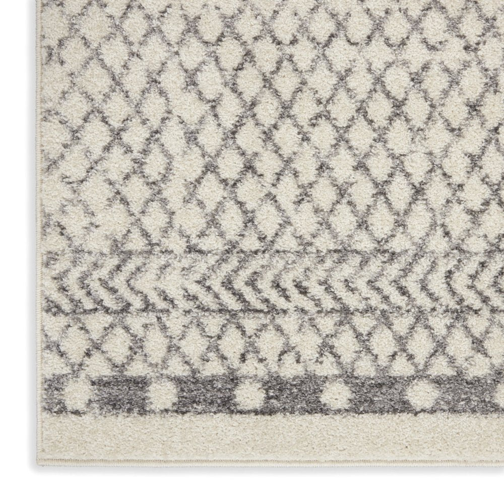 5' X 7' Gray And Ivory Geometric Distressed Area Rug
