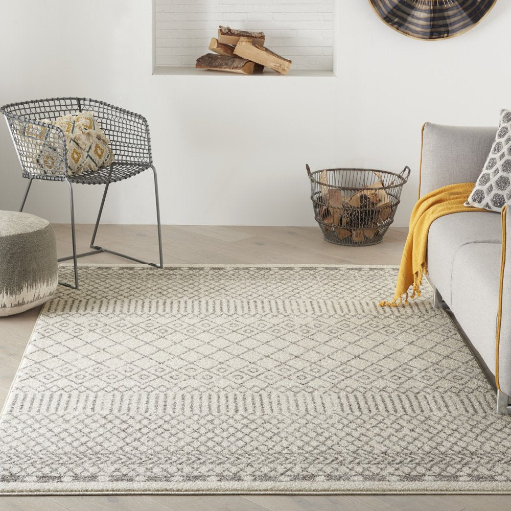 5' X 7' Gray And Ivory Geometric Distressed Area Rug