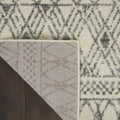 5' X 7' Gray And Ivory Geometric Area Rug