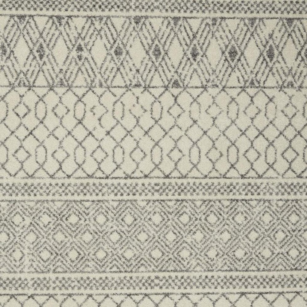 5' X 7' Gray And Ivory Geometric Area Rug