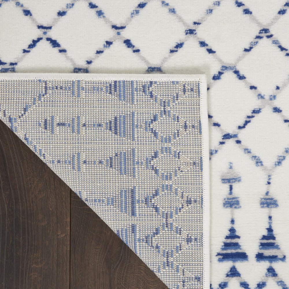 6' X 9' Ivory And Blue Geometric Area Rug