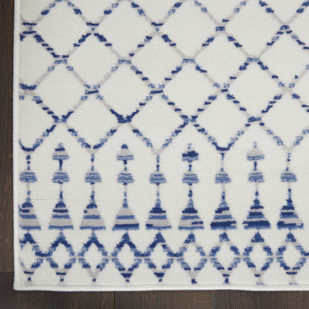 6' X 9' Ivory And Blue Geometric Area Rug