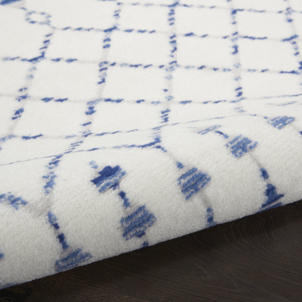 6' X 9' Ivory And Blue Geometric Area Rug