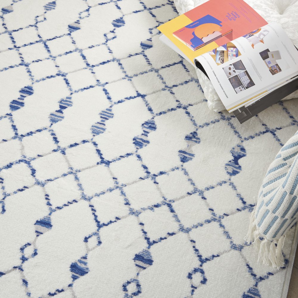 6' X 9' Ivory And Blue Geometric Area Rug