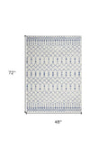 6' X 9' Ivory And Blue Geometric Area Rug