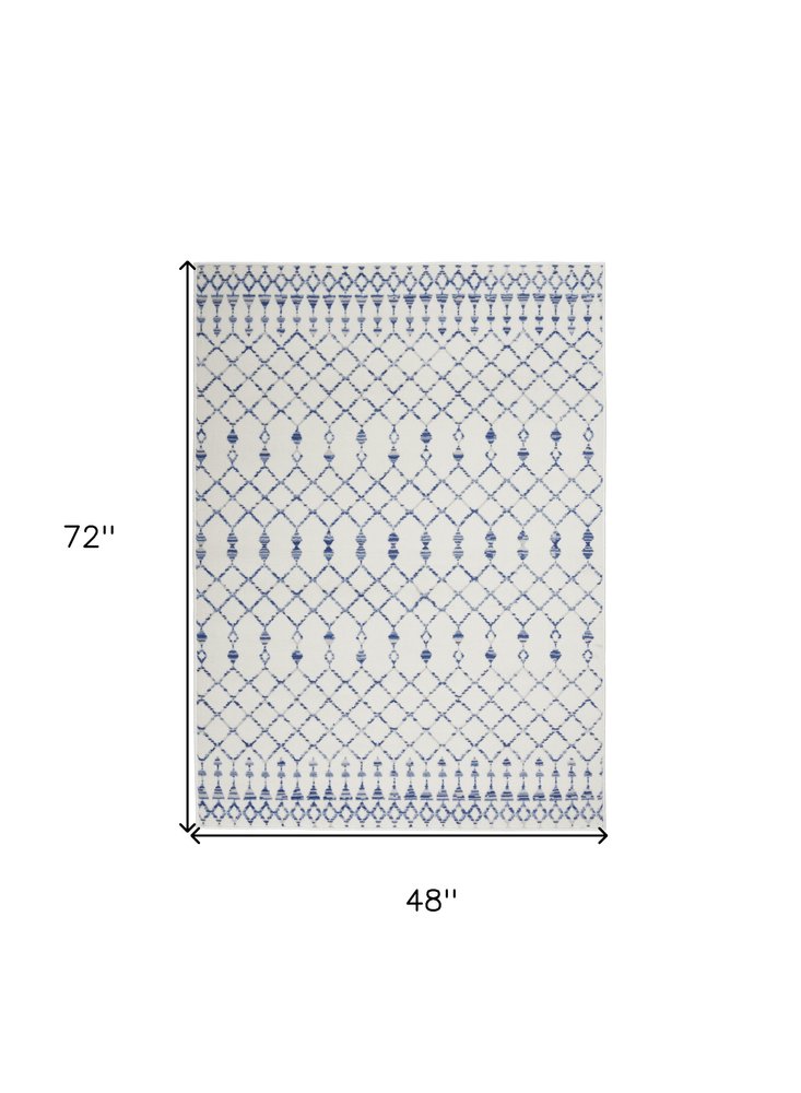 6' X 9' Ivory And Blue Geometric Area Rug