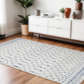 6' X 9' Ivory And Blue Geometric Area Rug