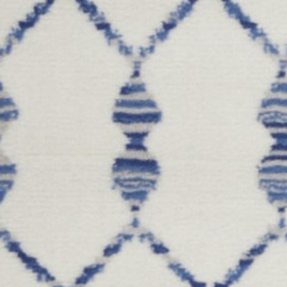 6' X 9' Ivory And Blue Geometric Area Rug