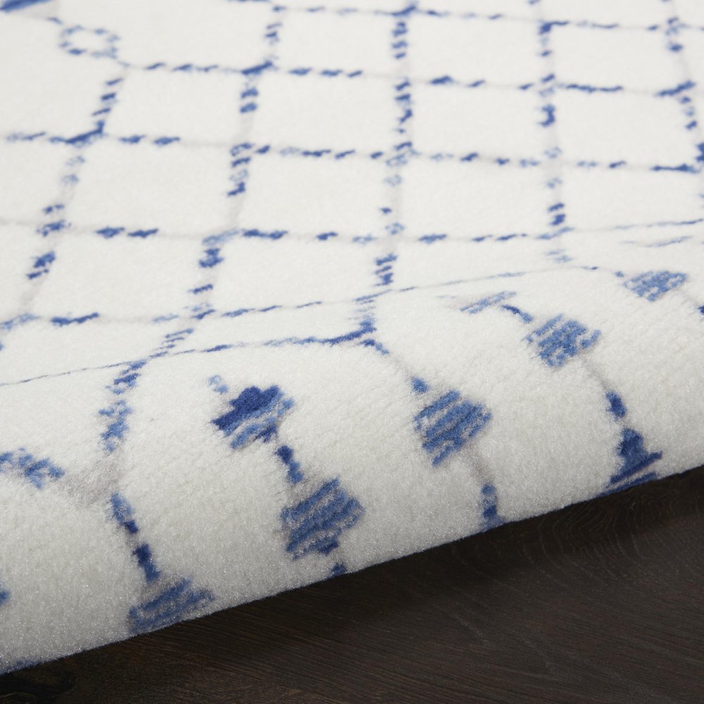 6' X 9' Ivory And Blue Geometric Area Rug
