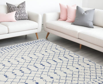 6' X 9' Ivory And Blue Geometric Area Rug