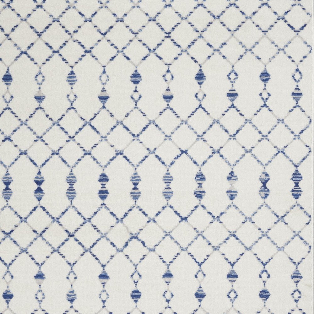 6' X 9' Ivory And Blue Geometric Area Rug