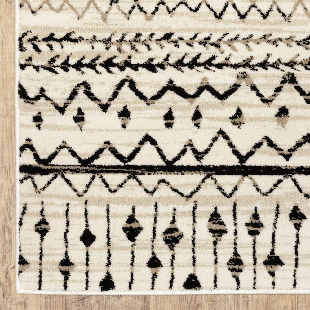 8' Ivory And Black Tribal Runner Rug