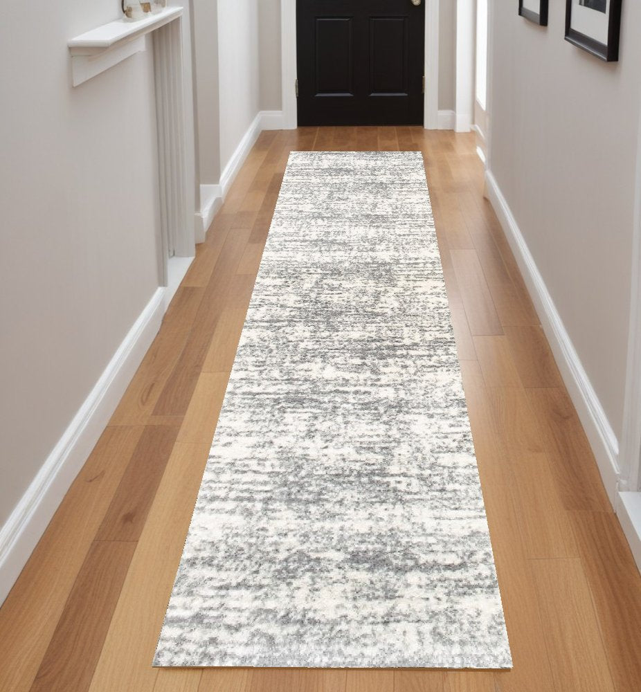 5' X 8' Ivory And Gray Abstract Strokes Area Rug