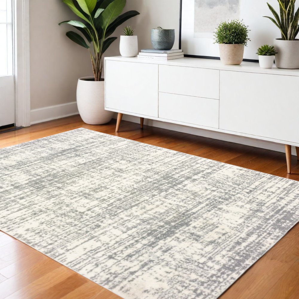 5' X 8' Ivory And Gray Abstract Strokes Area Rug