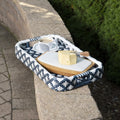 35" Navy Blue White And Natural Rolling Rattan Bar Cart