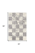 7' X 9' Gray and White Checkered Power Loom Distressed Area Rug