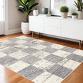 7' X 9' Gray and White Checkered Power Loom Distressed Area Rug