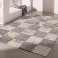 7' X 9' Gray and White Checkered Power Loom Distressed Area Rug