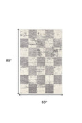 7' X 9' Gray and White Checkered Power Loom Distressed Area Rug