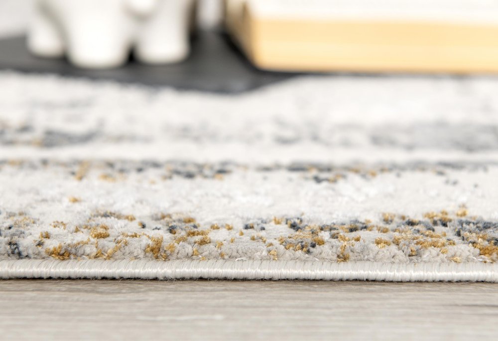 5' X 8' Gray and Ivory Abstract Power Loom Area Rug