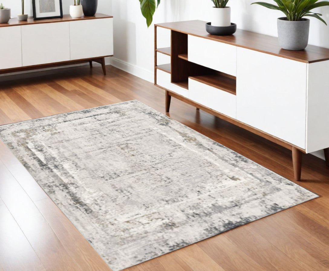 4' X 6' Gray and Ivory Abstract Power Loom Area Rug