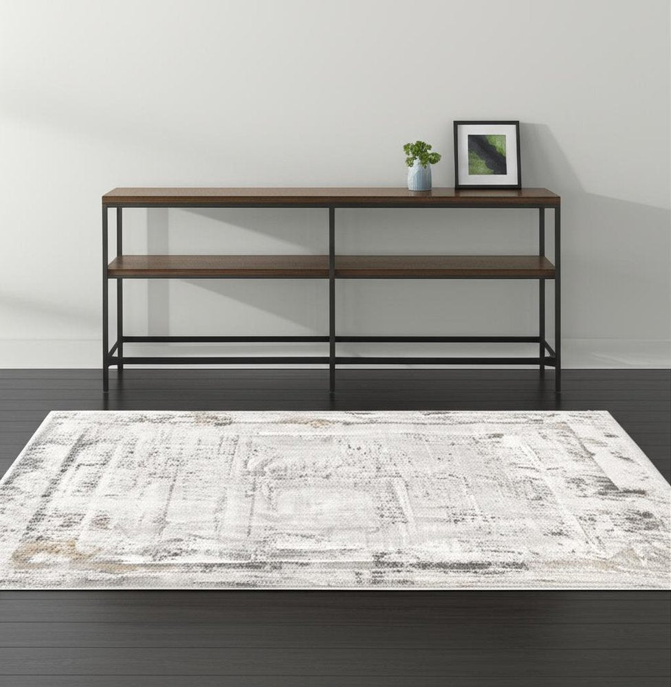 5' X 8' Gray and Ivory Abstract Power Loom Area Rug