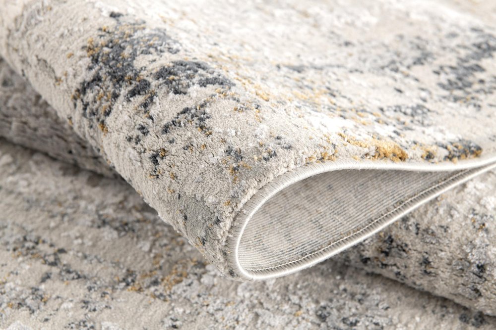 5' X 8' Gray and Ivory Abstract Power Loom Area Rug