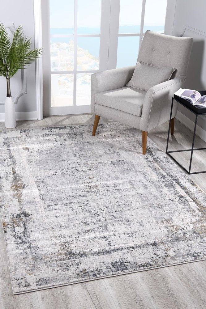 5' X 8' Gray and Ivory Abstract Power Loom Area Rug