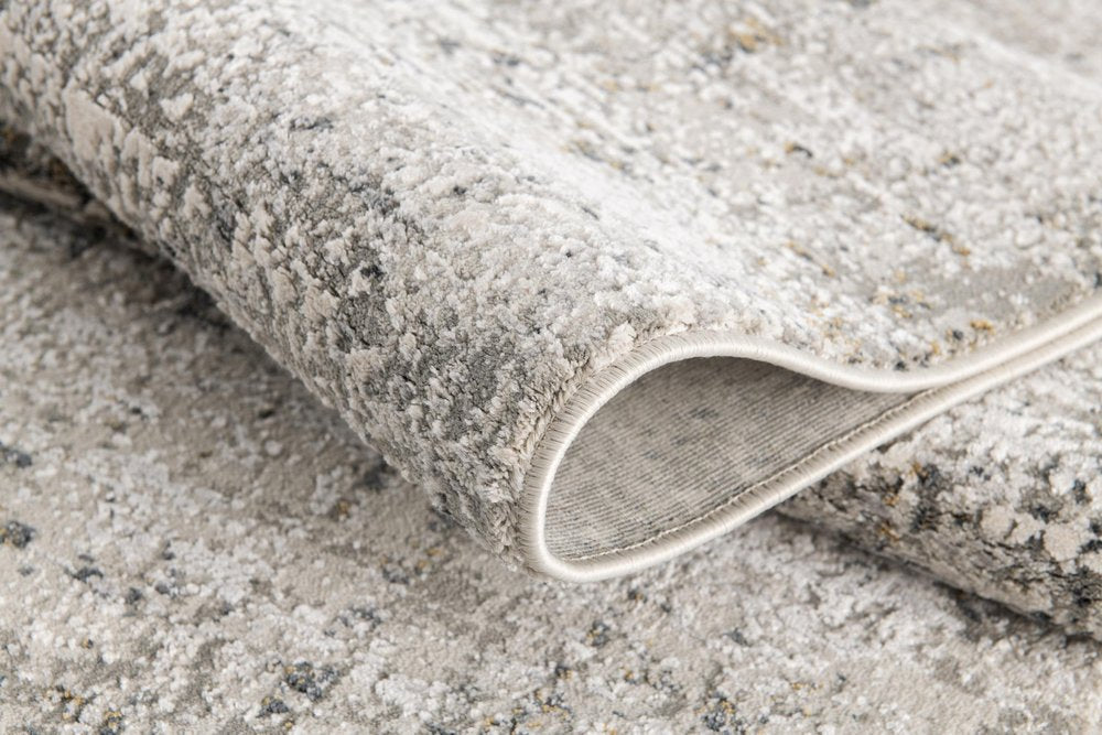 5' X 7' Gray and Ivory Abstract Area Rug