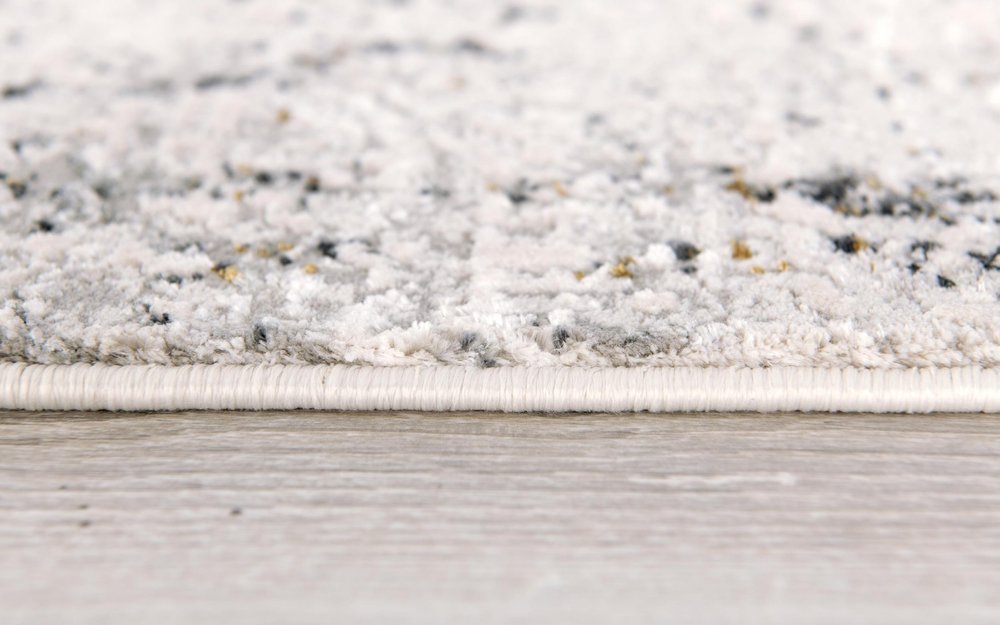 5' X 7' Gray and Ivory Abstract Area Rug