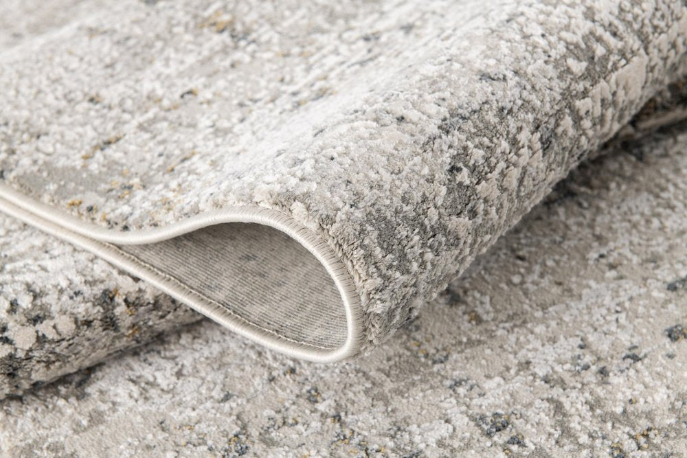 5' X 7' Gray and Ivory Abstract Area Rug