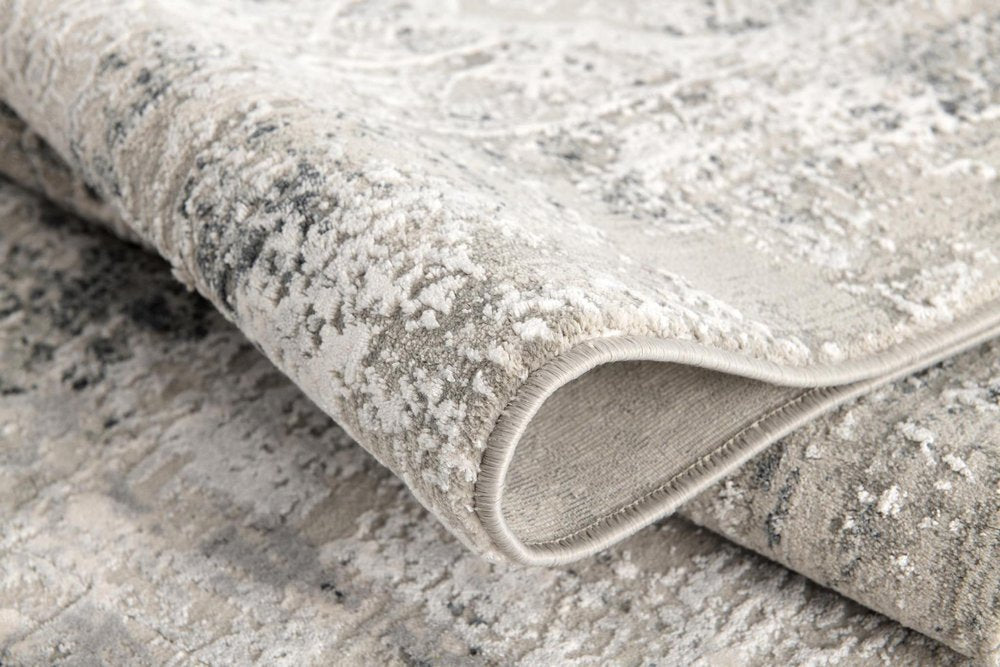 5' X 7' Gray and Ivory Abstract Area Rug