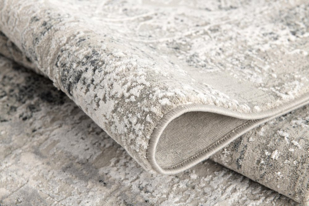 5' X 7' Gray and Ivory Abstract Area Rug