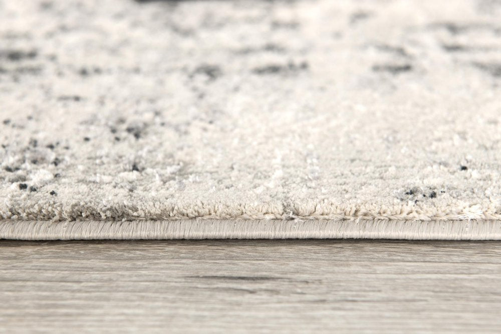 5' X 7' Gray and Ivory Abstract Area Rug