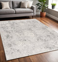 5' X 7' Gray and Ivory Abstract Area Rug