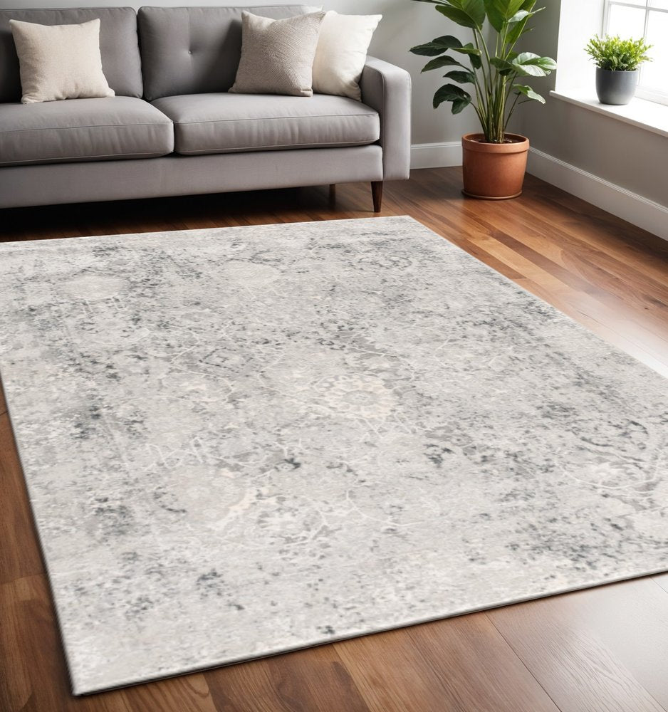 5' X 7' Gray and Ivory Abstract Area Rug