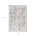 5' X 7' Gray and Ivory Abstract Area Rug