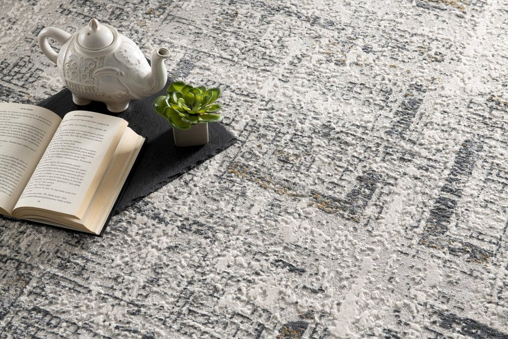 5' X 8' Gray and Ivory Abstract Power Loom Area Rug