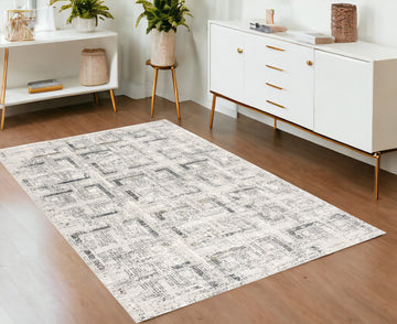 4' X 6' Gray and Ivory Abstract Power Loom Area Rug