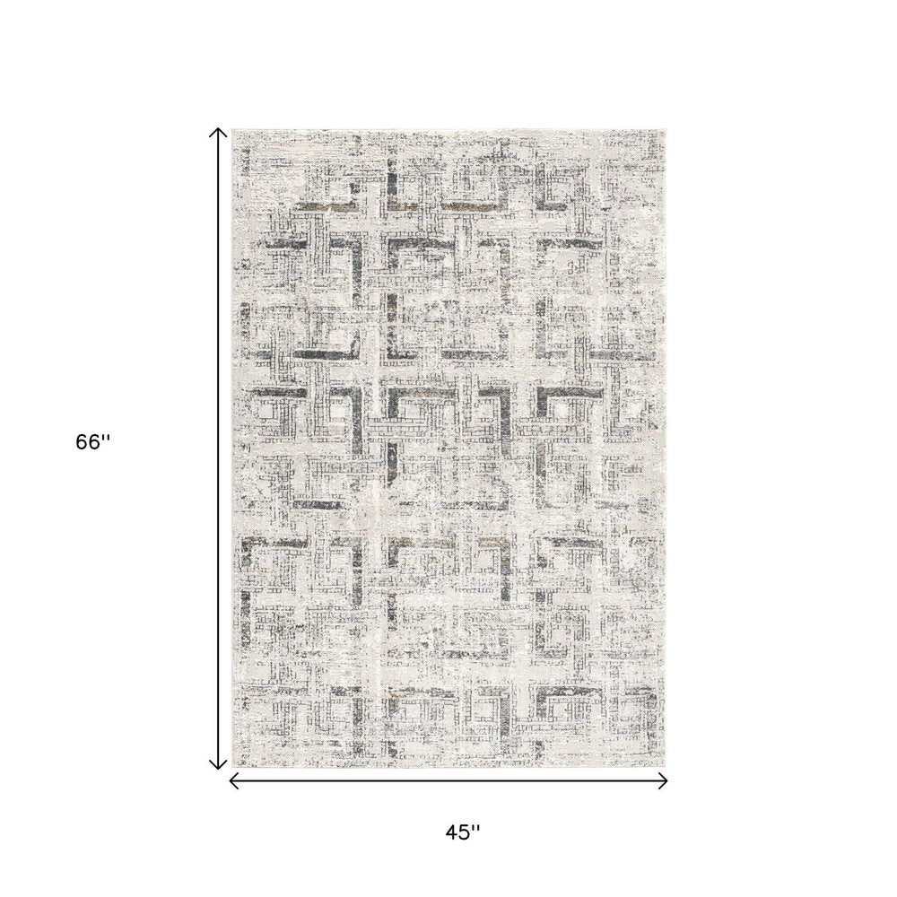 5' X 8' Gray and Ivory Abstract Power Loom Area Rug