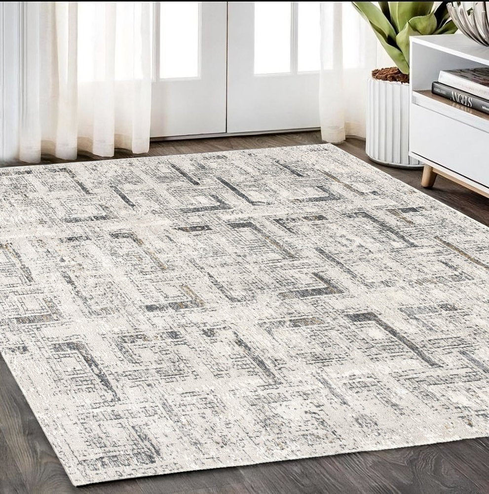 5' X 8' Gray and Ivory Abstract Power Loom Area Rug