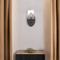 One Light Bronze Wall Light with Clear Glass Shade