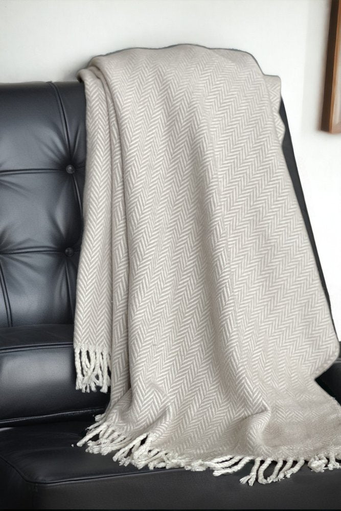 70" X 55" Gray And White Herringbone Cotton Blend Woven Throw Blanket with Tassels
