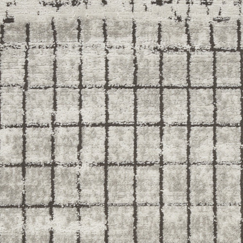 2' X 4' Ivory And Grey Abstract Power Loom Distressed Non Skid Area Rug