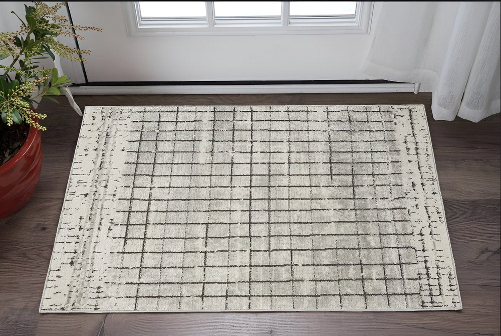 3' X 5' Ivory And Grey Abstract Power Loom Distressed Non Skid Area Rug