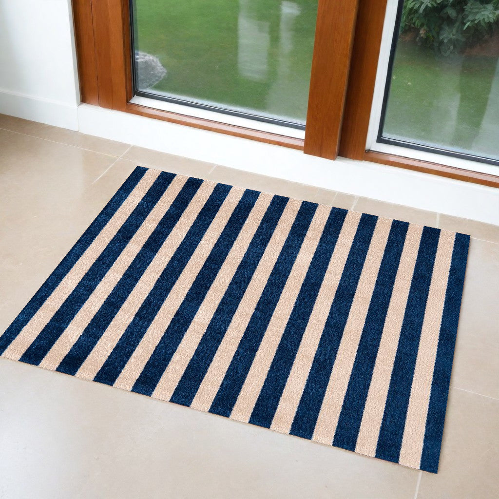 2' X 4' Navy And Sand Striped Tufted Washable Non Skid Area Rug