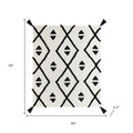 50" X 60" Black and White Woven Cotton Geometric Throw Blanket with Tassels
